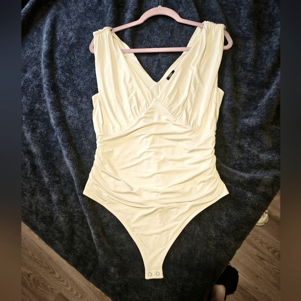 Ivory bodysuit from Express, never worn